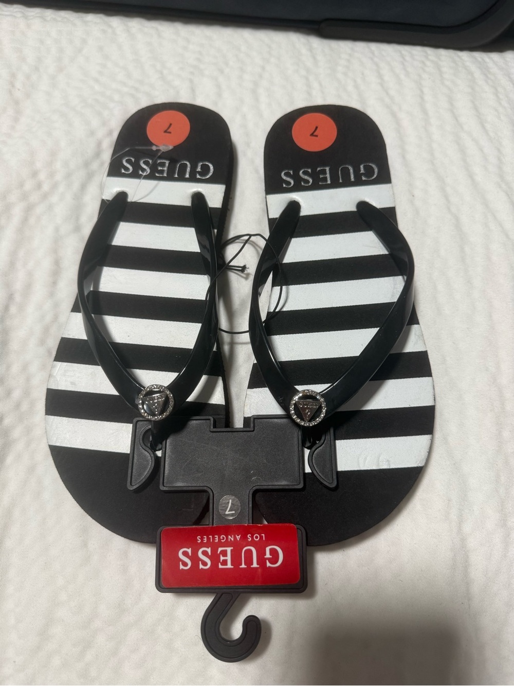 Guess Black and White Striped Logo Flip Flops